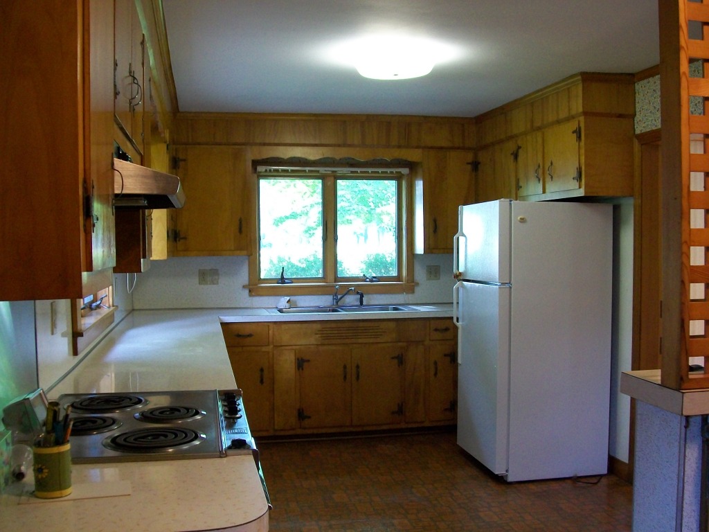 34 Albany Road West Stockbridge, MA 01266 - Photo 13 of 34 a kitchen with kitchen island a counter top space a sink stainless steel appliances and cabinets