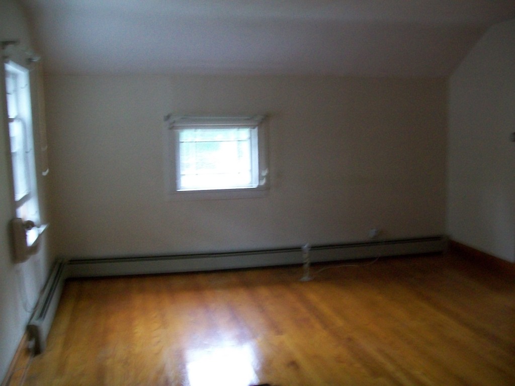 34 Albany Road West Stockbridge, MA 01266 - Photo 22 of 34 an empty room with a window