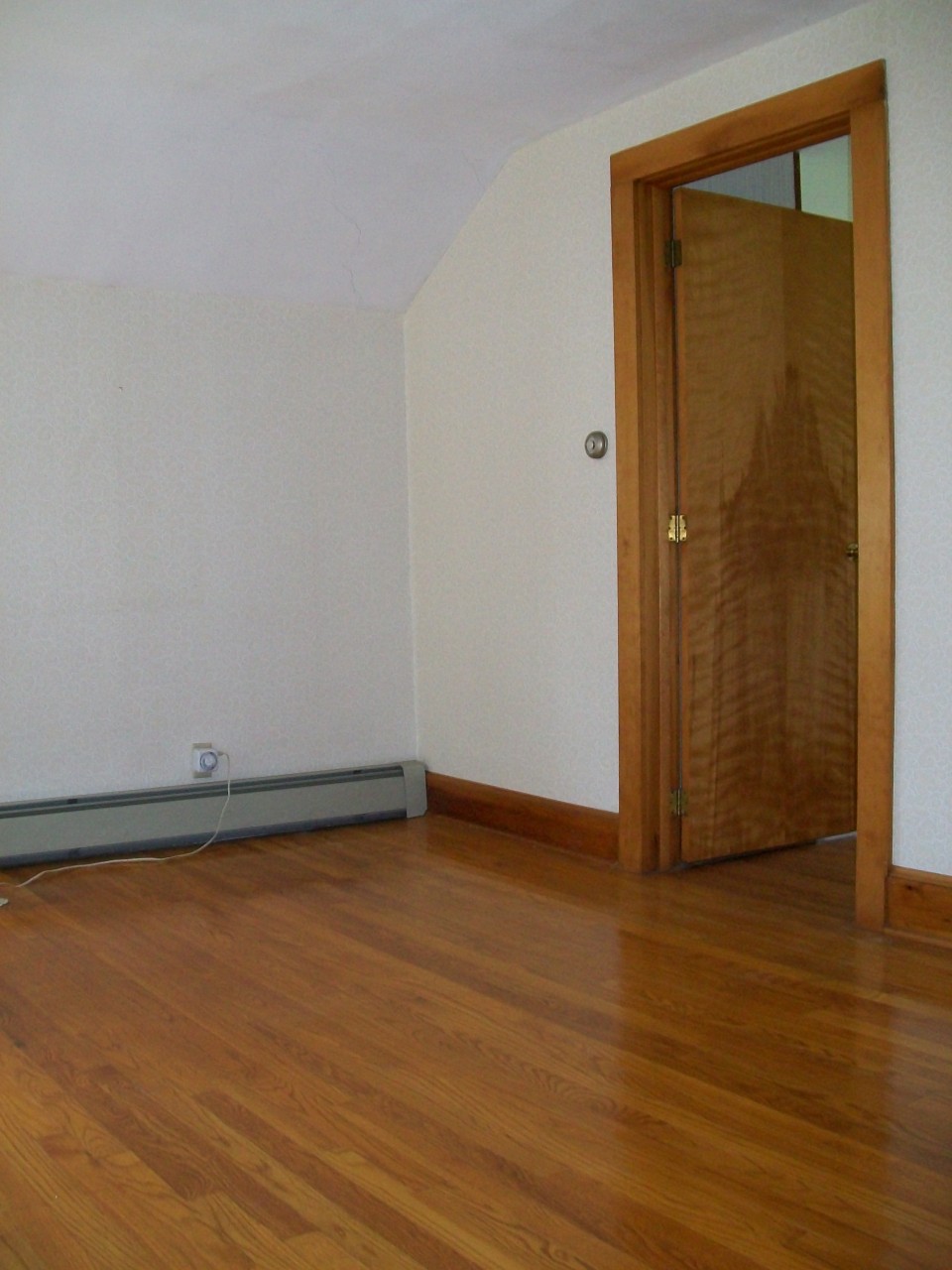 34 Albany Road West Stockbridge, MA 01266 - Photo 26 of 34 a view of an empty room with wooden floor and a window