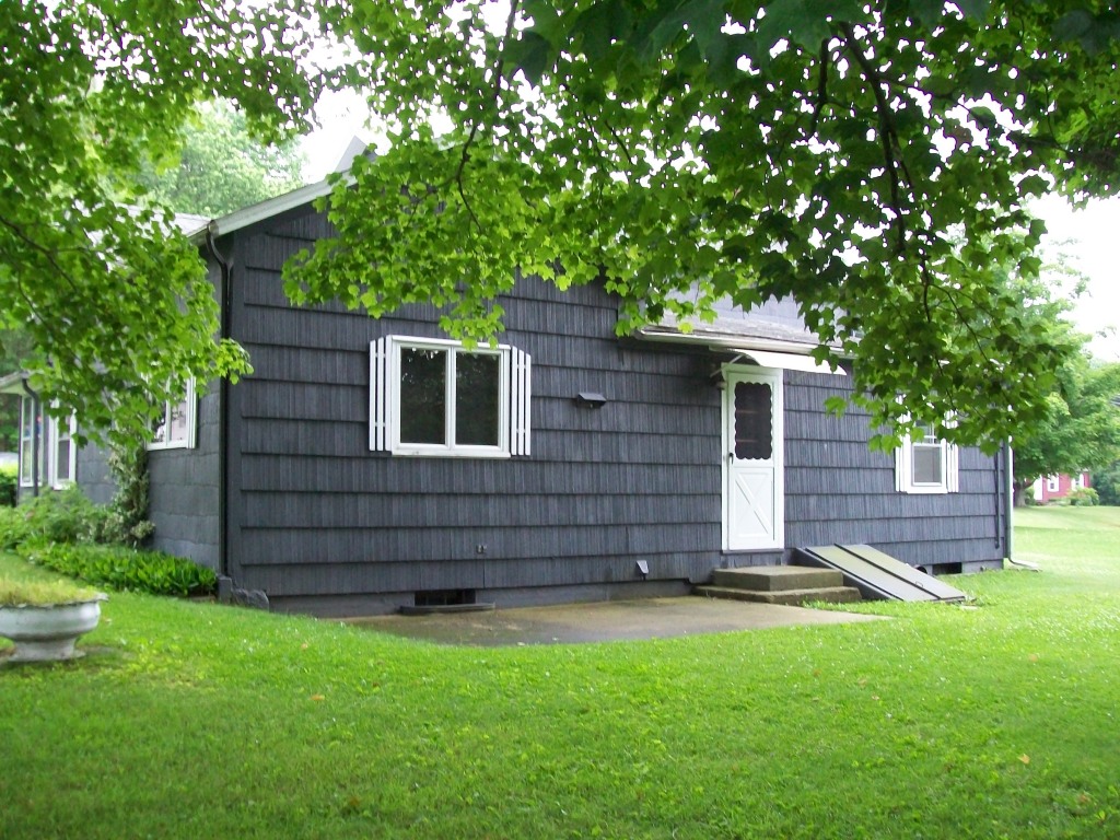 34 Albany Road West Stockbridge, MA 01266 - Photo 30 of 34 a front view of a house with a yard