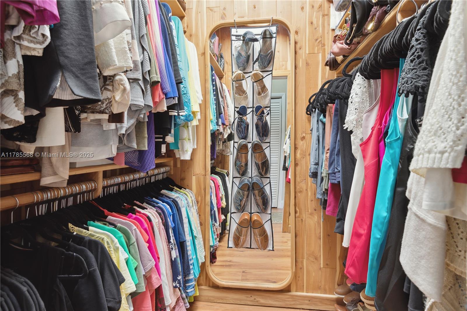 16634 Golfview Drive Weston, FL 33326 - Photo 15 of 29 a view of walk in closet with clothes