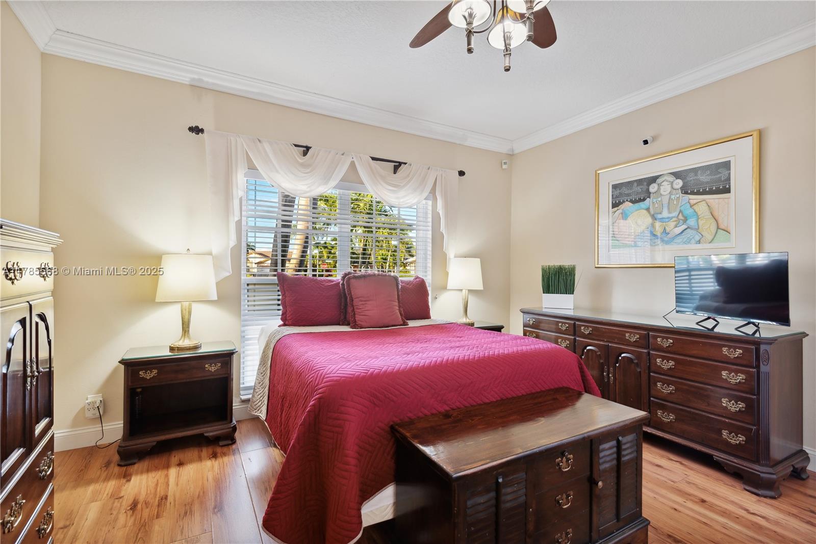 16634 Golfview Drive Weston, FL 33326 - Photo 16 of 29 a bedroom with a bed and a dresser