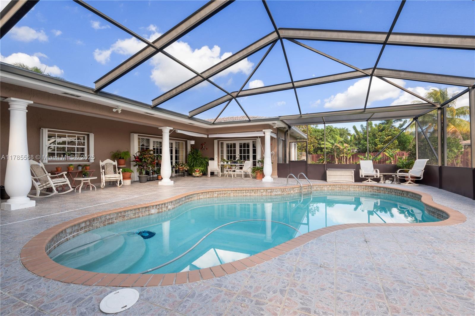 16634 Golfview Drive Weston, FL 33326 - Photo 22 of 29 a view of swimming pool with sitting area