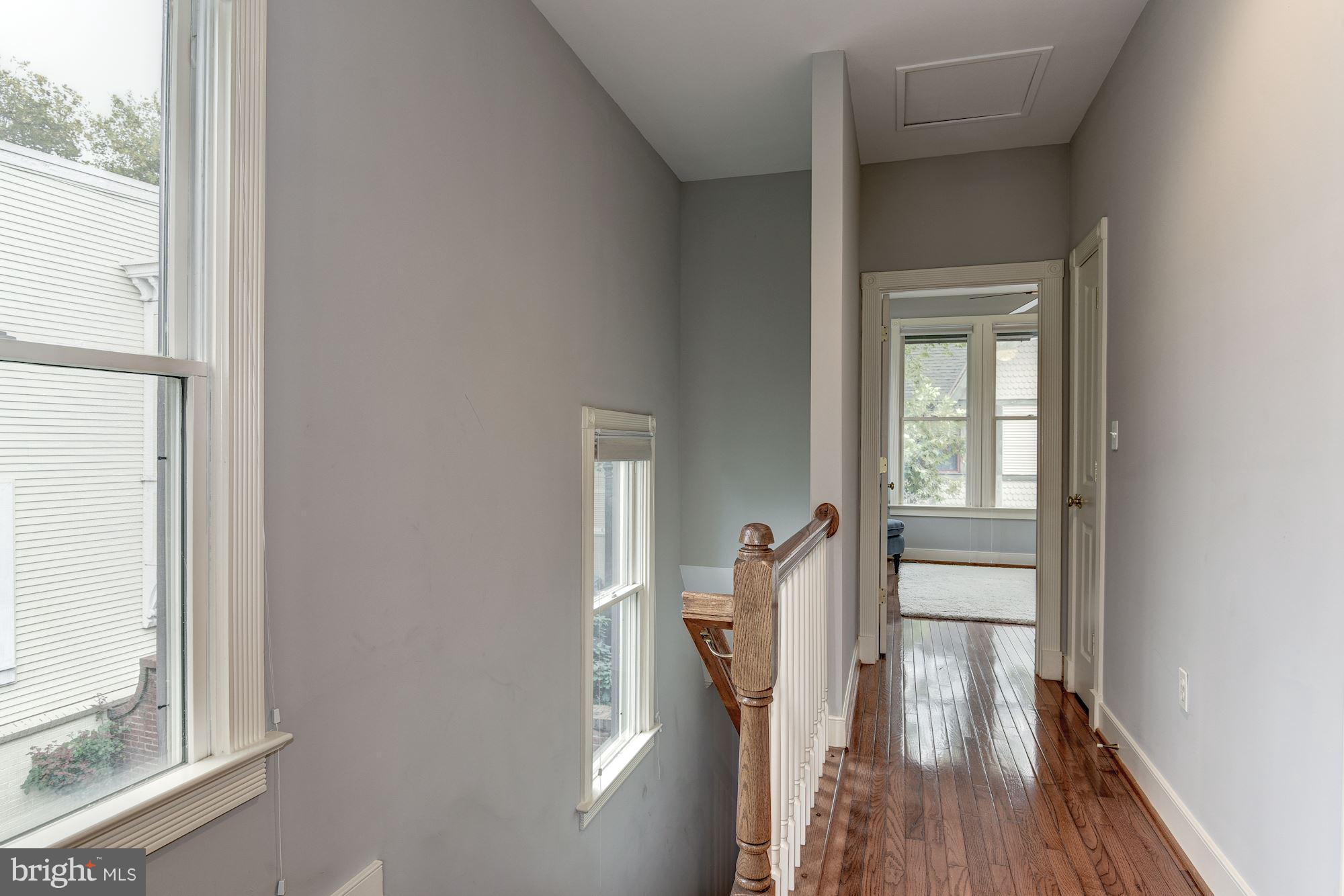 625 Ellen Wilson Place Southeast Washington, DC 20003 - Photo 15 of 26 a view of a hallway with wooden floor and a livingroom