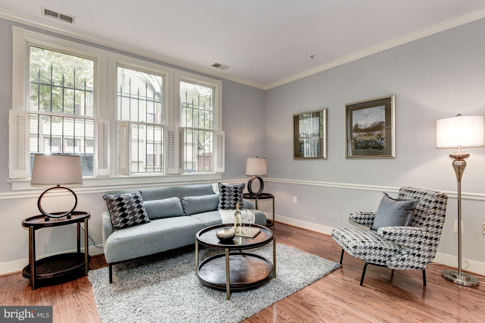 625 Ellen Wilson Place Southeast Washington, DC 20003 - Photo 5 of 26 a living room with furniture and a window