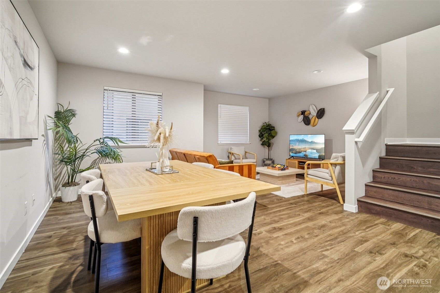 a very nice looking dining room with a table and chairs