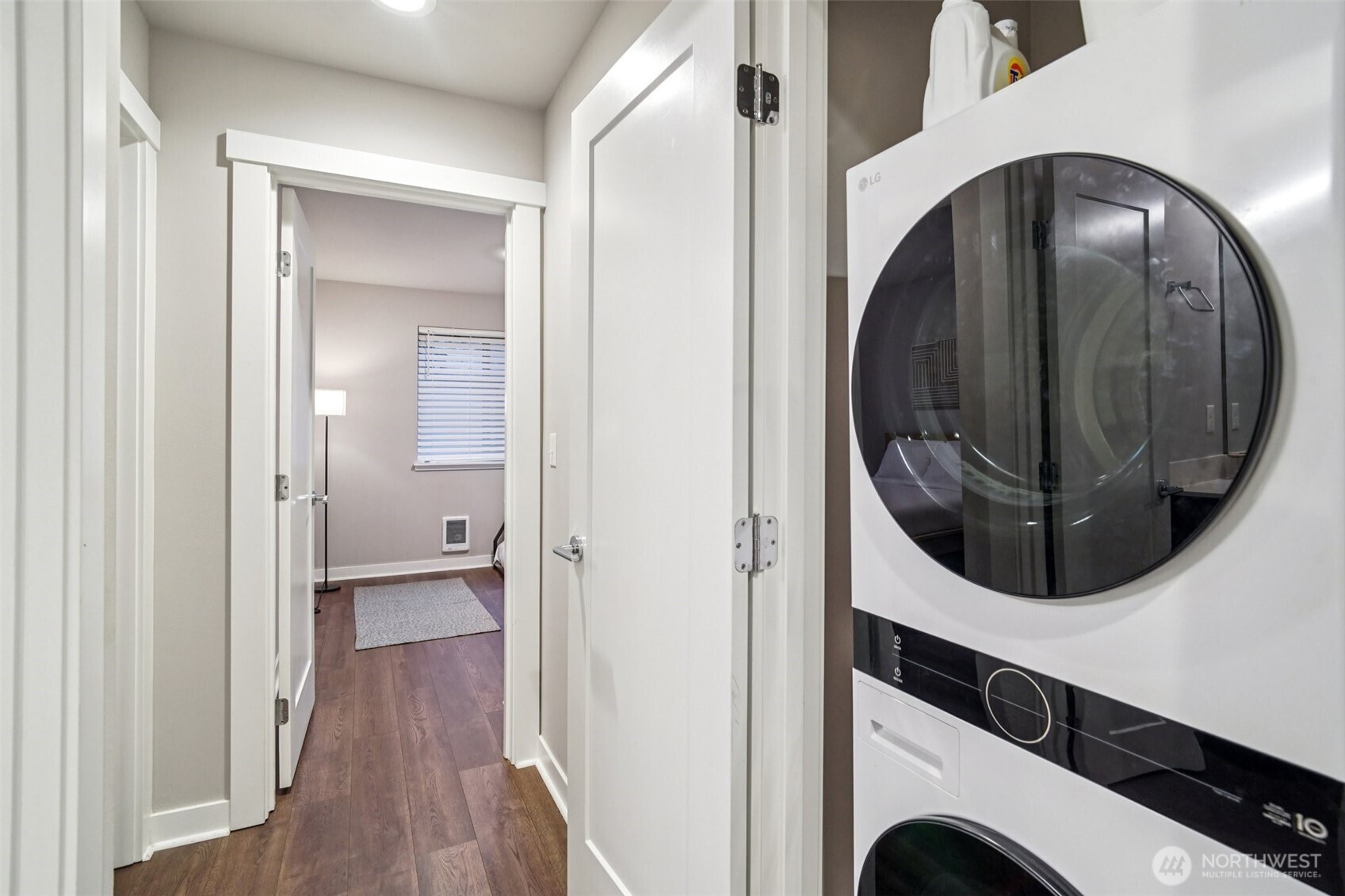 4908 South Willow Street, Unit B Seattle, WA 98118 - Photo 15 of 29 a view of a hallway with wooden floor