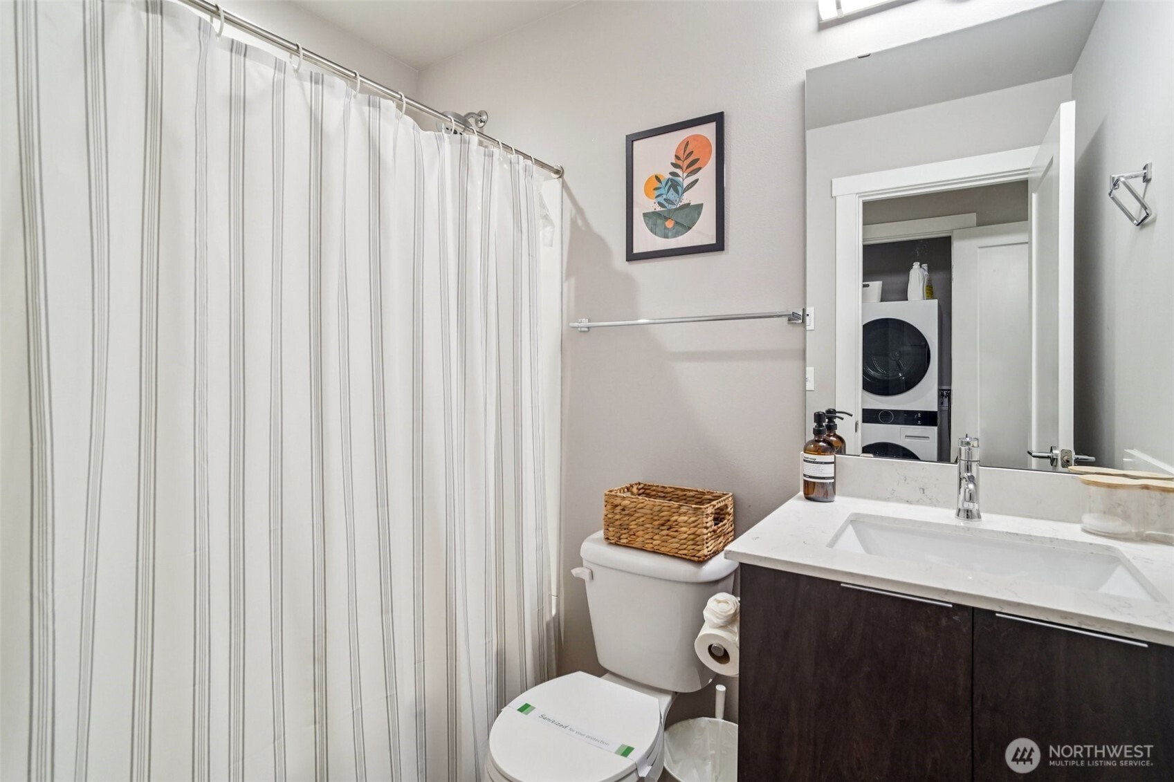 4908 South Willow Street, Unit B Seattle, WA 98118 - Photo 17 of 29 a bathroom with a toilet a sink and curtain