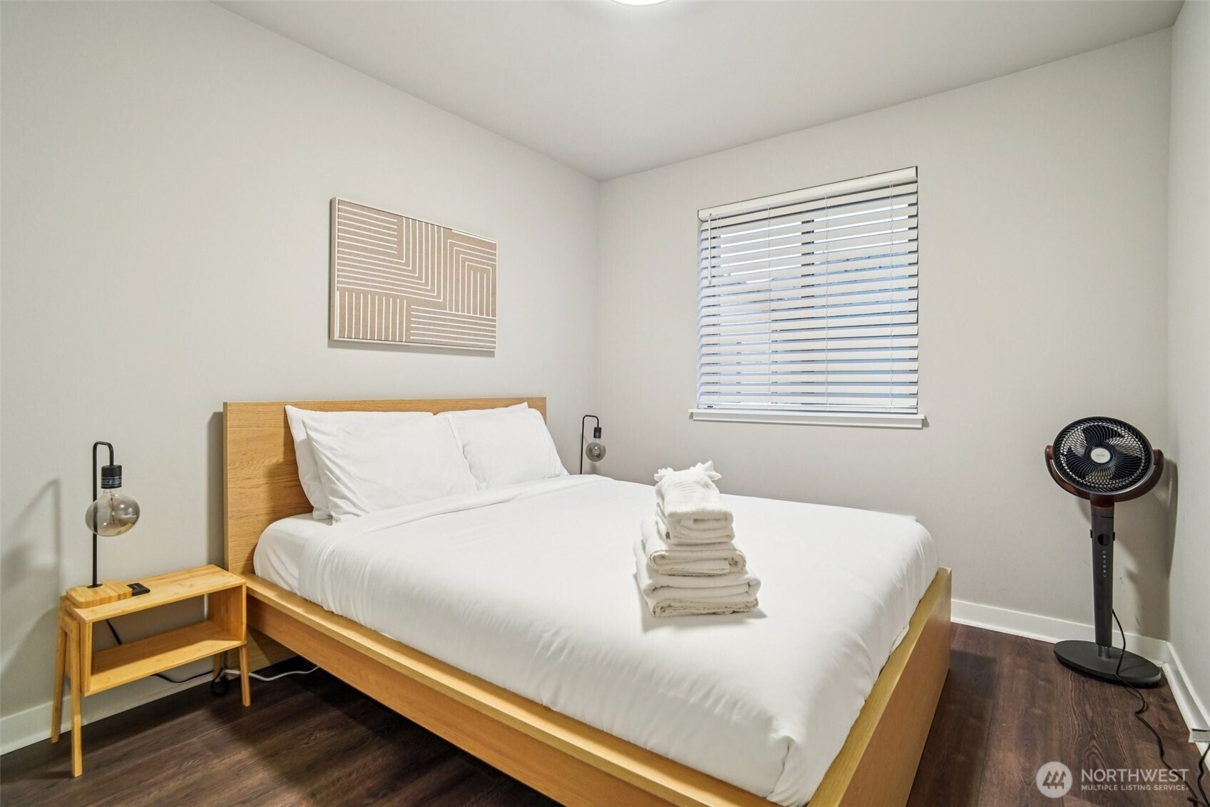 4908 South Willow Street, Unit B Seattle, WA 98118 - Photo 18 of 29 a bedroom with a bed and a window