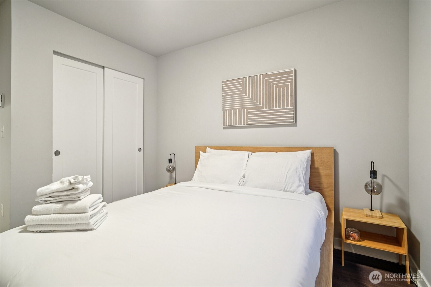 4908 South Willow Street, Unit B Seattle, WA 98118 - Photo 19 of 29 a bedroom with a bed and a window