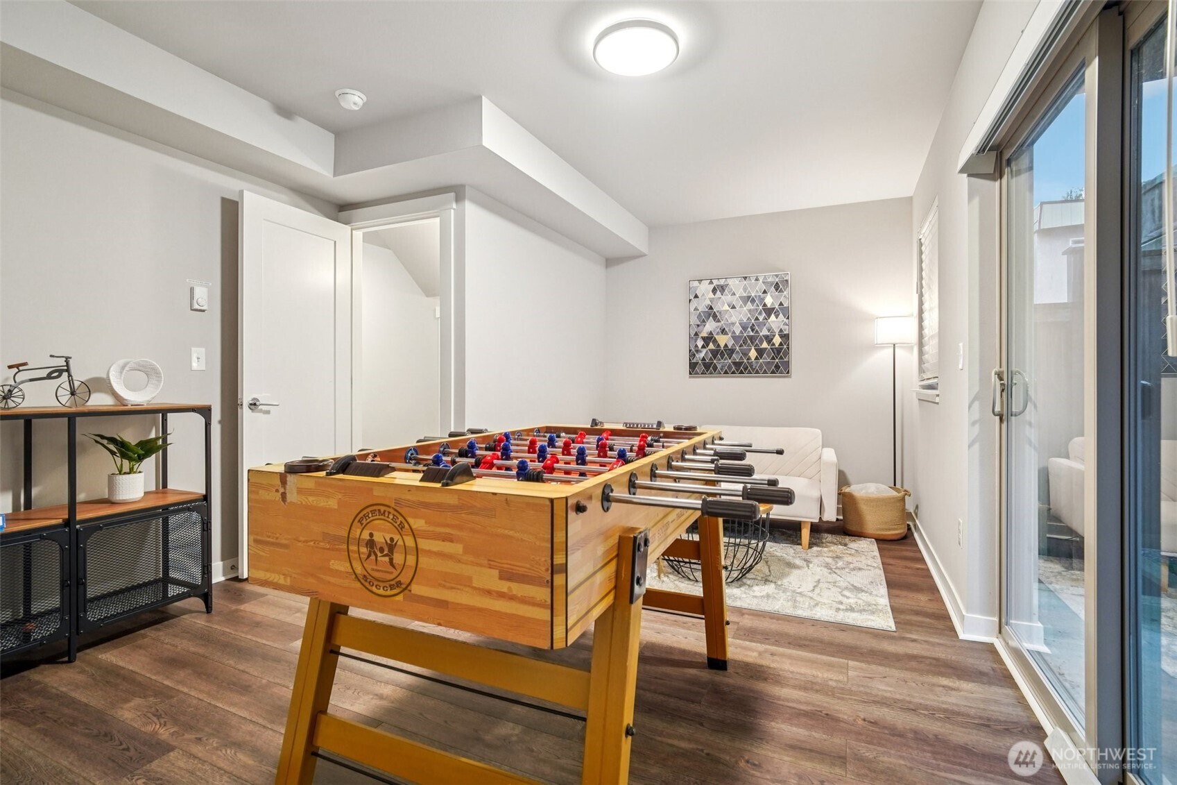 4908 South Willow Street, Unit B Seattle, WA 98118 - Photo 23 of 29 a area with table and chairs