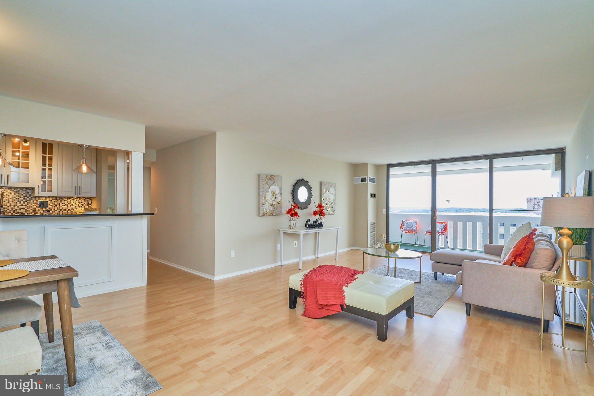 6101 Edsall Road, Unit 1707 Alexandria, VA 22304 - Photo 6 of 45 Maple wood flooring in living room