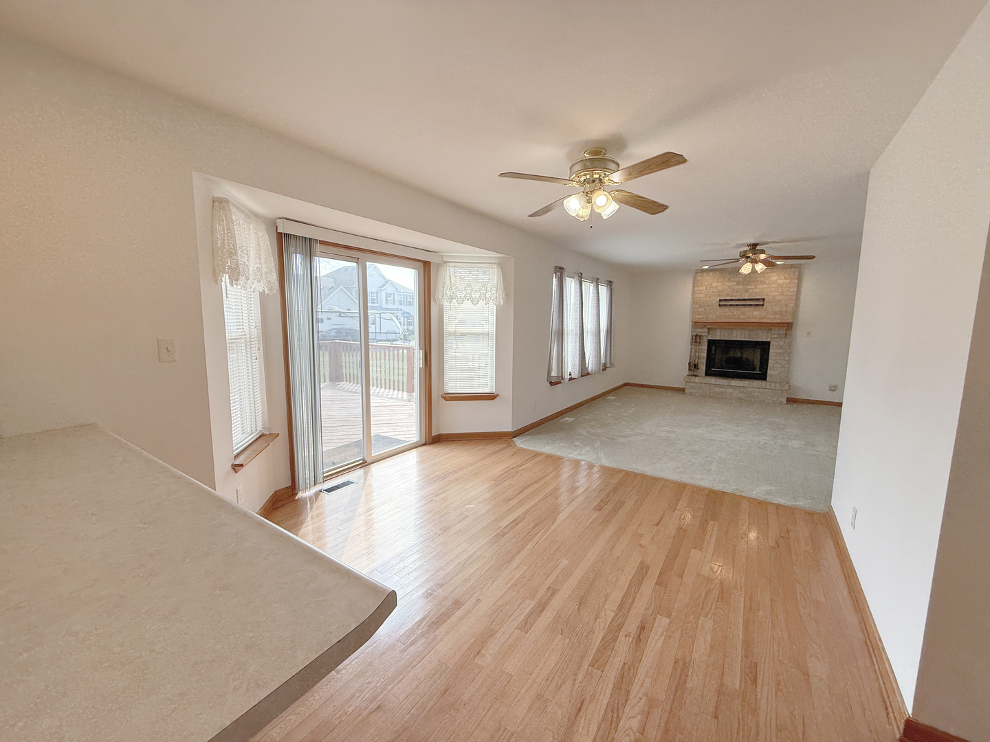1278 Knolls Avenue South DeKalb, IL 60115 - Photo 14 of 35 wooden floor in an empty room with a window