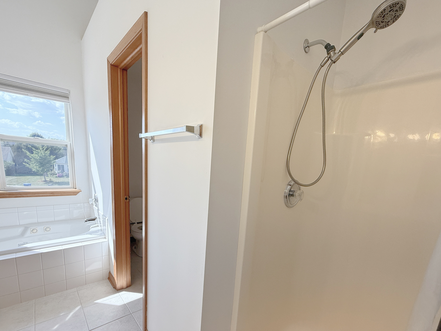 1278 Knolls Avenue South DeKalb, IL 60115 - Photo 25 of 35 a bathroom that has a shower sink and a shower