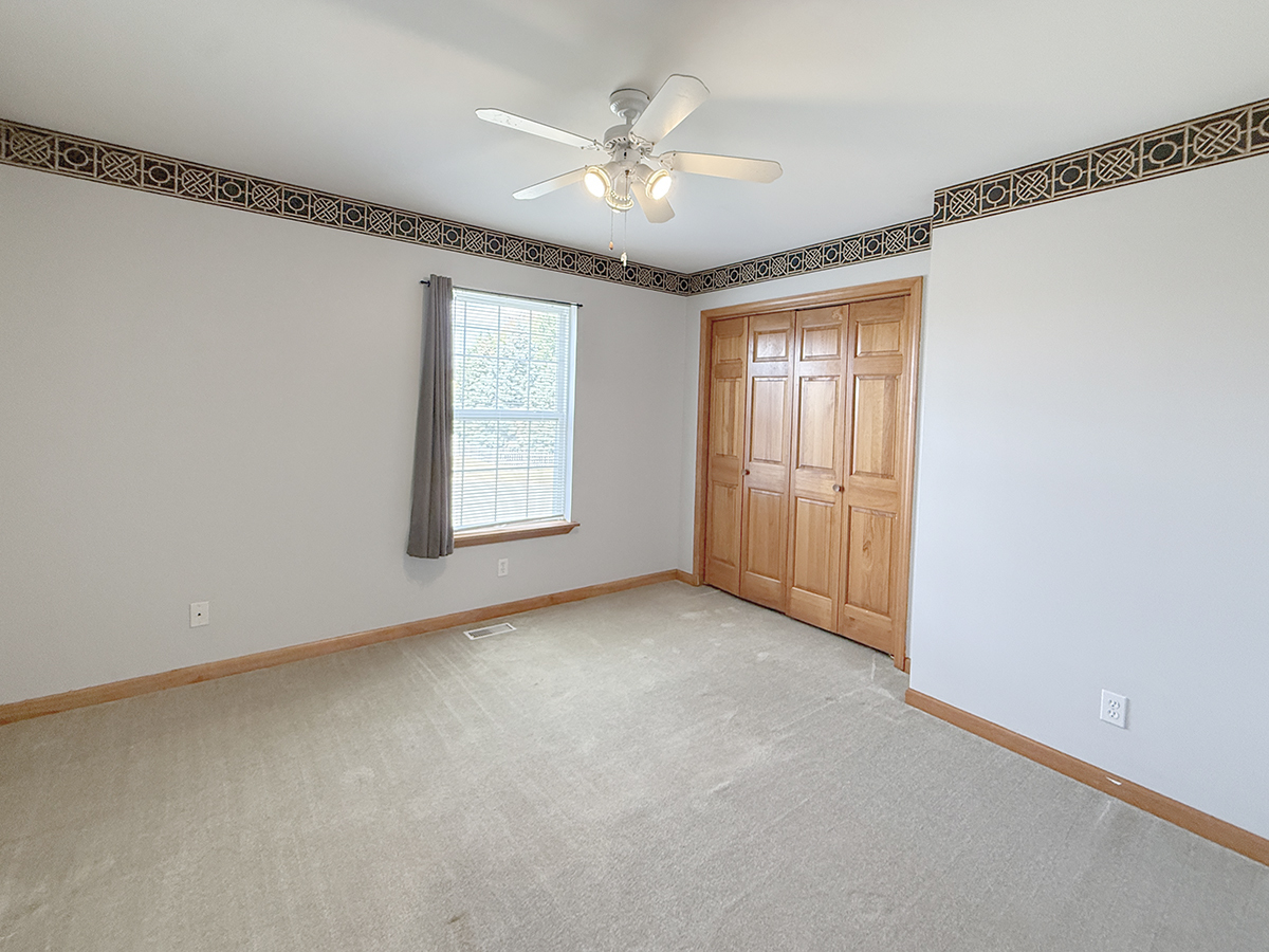 1278 Knolls Avenue South DeKalb, IL 60115 - Photo 28 of 35 a view of an empty room with a window