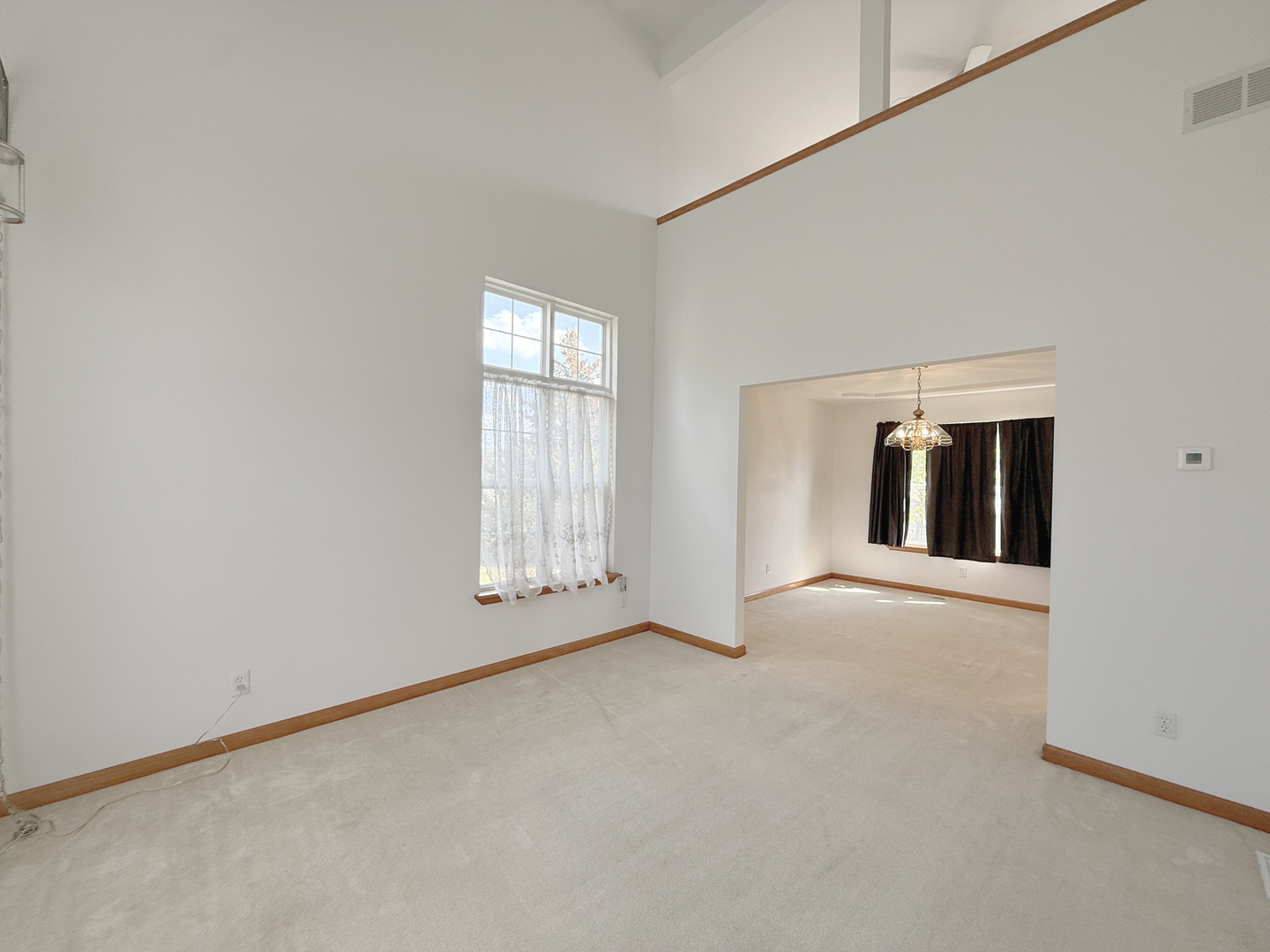 1278 Knolls Avenue South DeKalb, IL 60115 - Photo 5 of 35 an empty room with windows