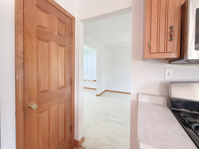 a view of a kitchen with an entryway