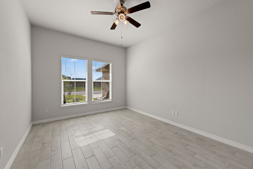 213 Gauge Road Thorndale, TX 76577 - Photo 19 of 40 a view of an empty room with a window