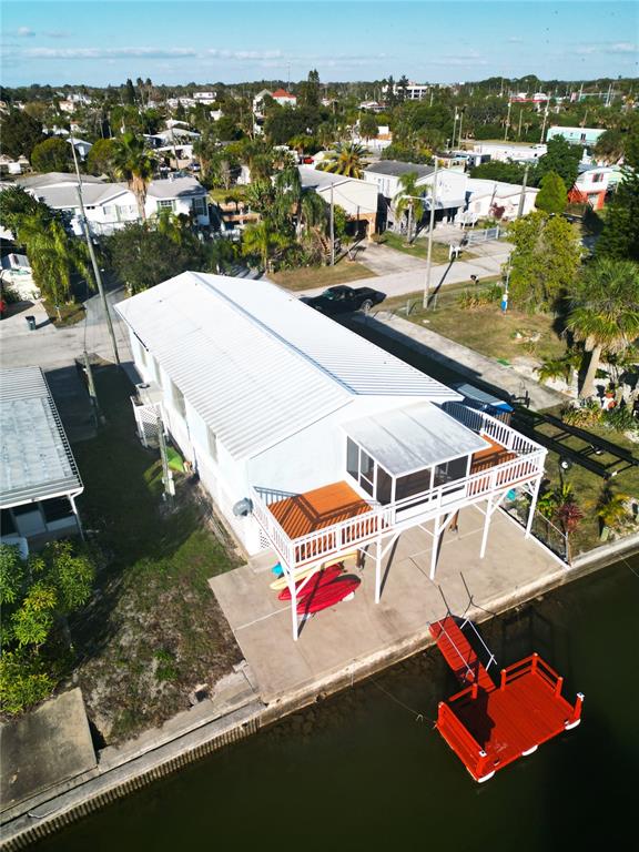 6814 Gull Lane Hudson, FL 34667 - Photo 10 of 51 an aerial view of residential houses with outdoor space