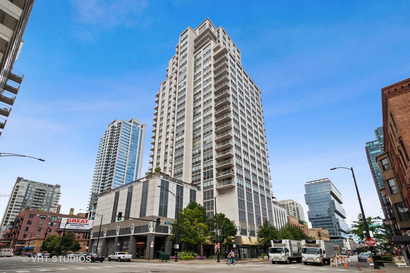 a view of a city with tall buildings