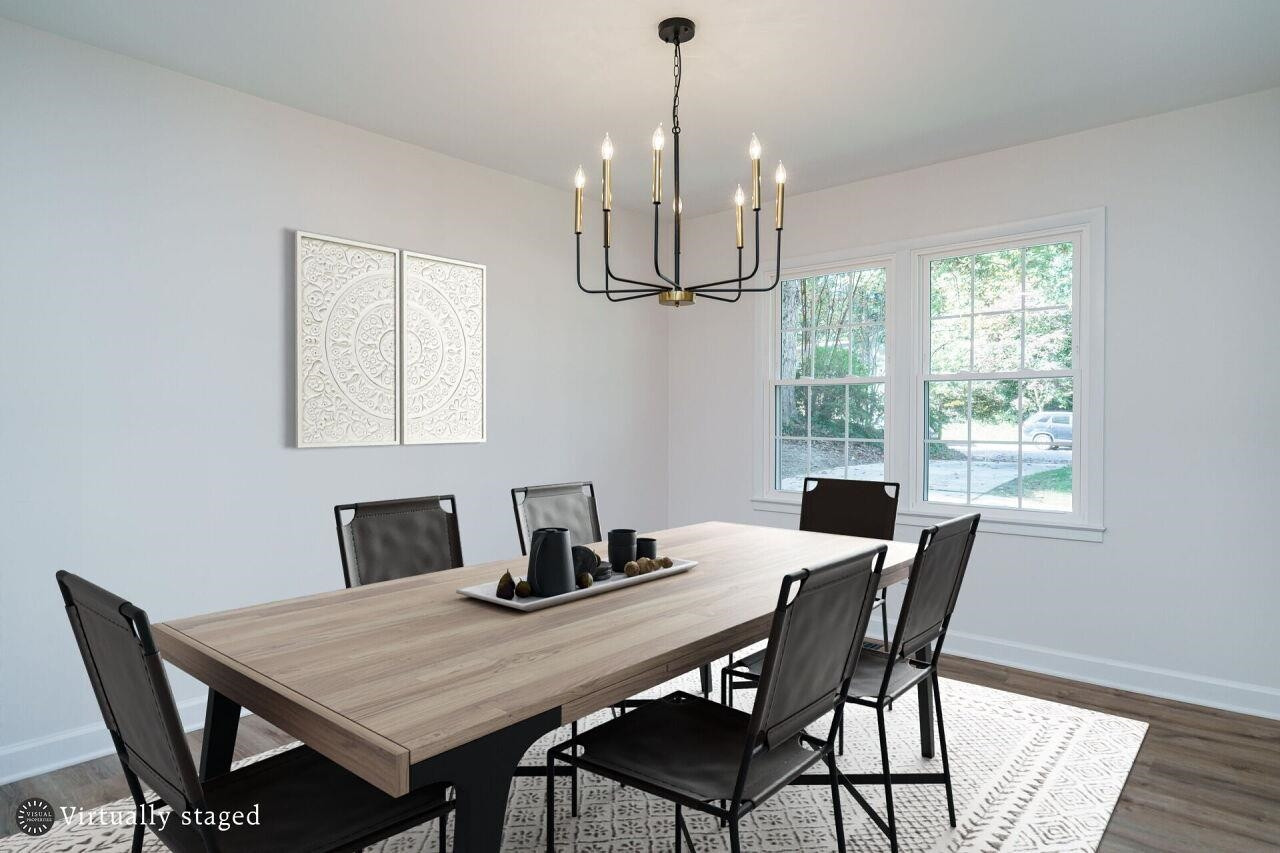 1436 Princess Anne Road Raleigh, NC 27607 - Photo 11 of 36 a view of a dining room with furniture window and outside view