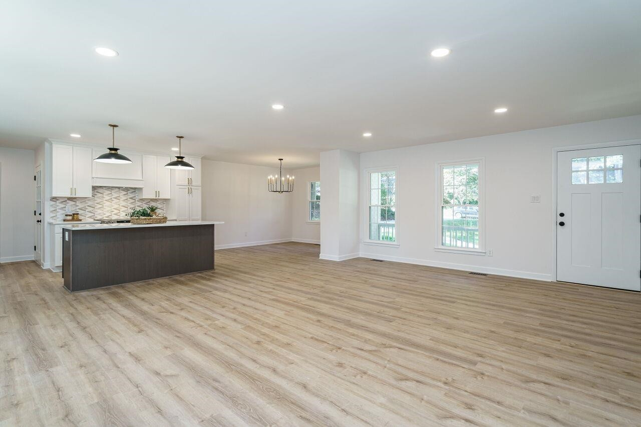 1436 Princess Anne Road Raleigh, NC 27607 - Photo 14 of 36 a view of kitchen and kitchen with a sink wooden cabinets