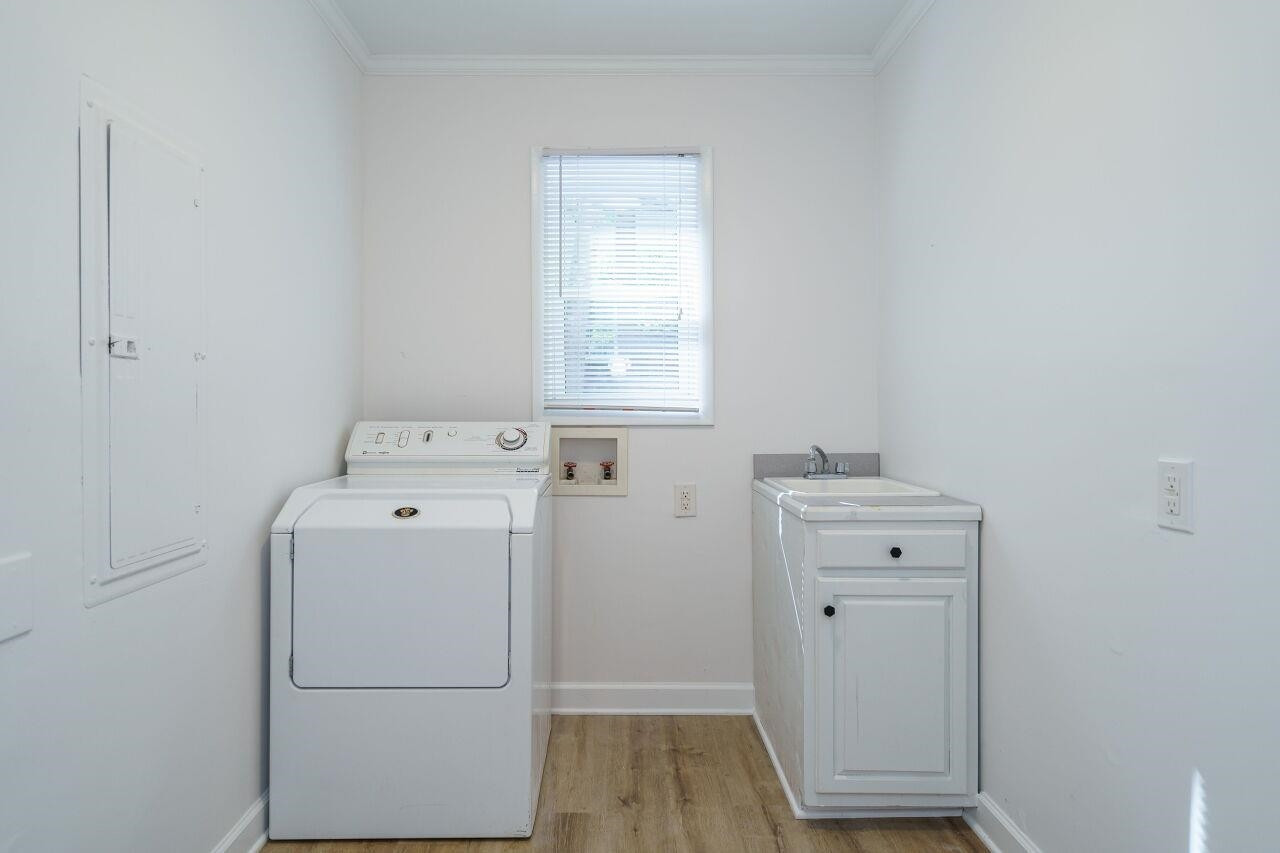 1436 Princess Anne Road Raleigh, NC 27607 - Photo 16 of 36 a view of utility room with washer and dryer