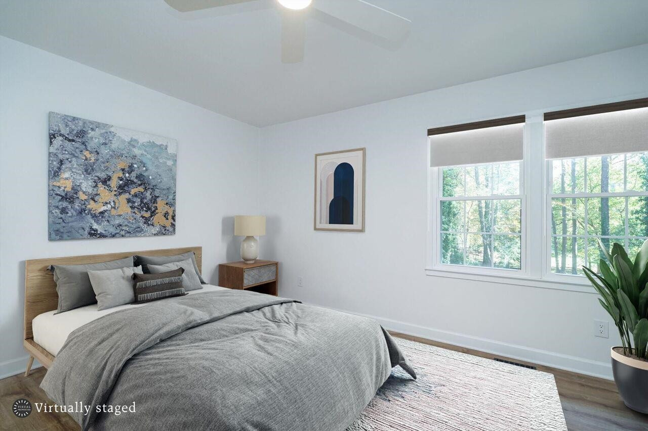 1436 Princess Anne Road Raleigh, NC 27607 - Photo 18 of 36 a bedroom with bed and window