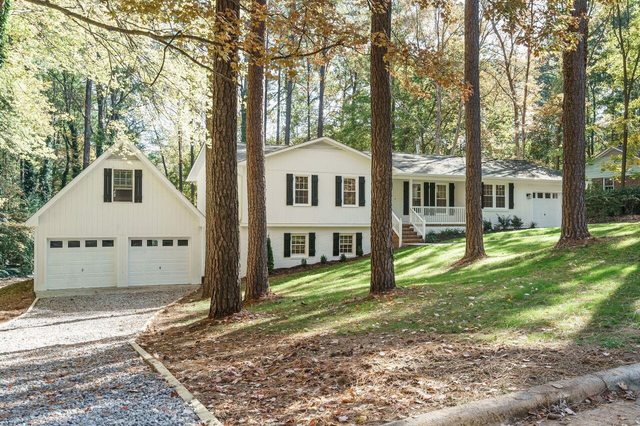 1436 Princess Anne Road Raleigh, NC 27607 - Photo 2 of 36 front view of a house with a yard