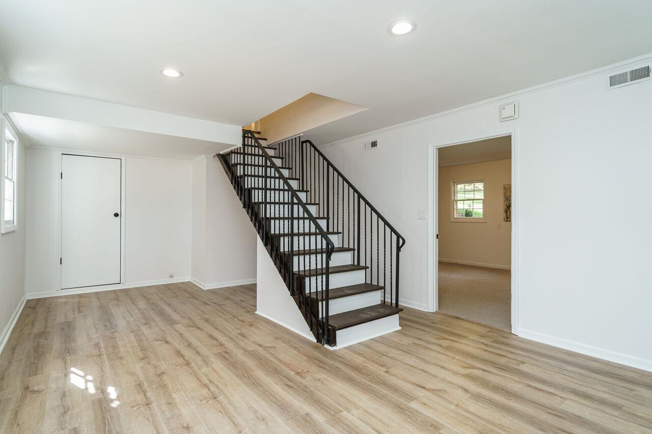 1436 Princess Anne Road Raleigh, NC 27607 - Photo 27 of 36 a view of a hallway with staircase