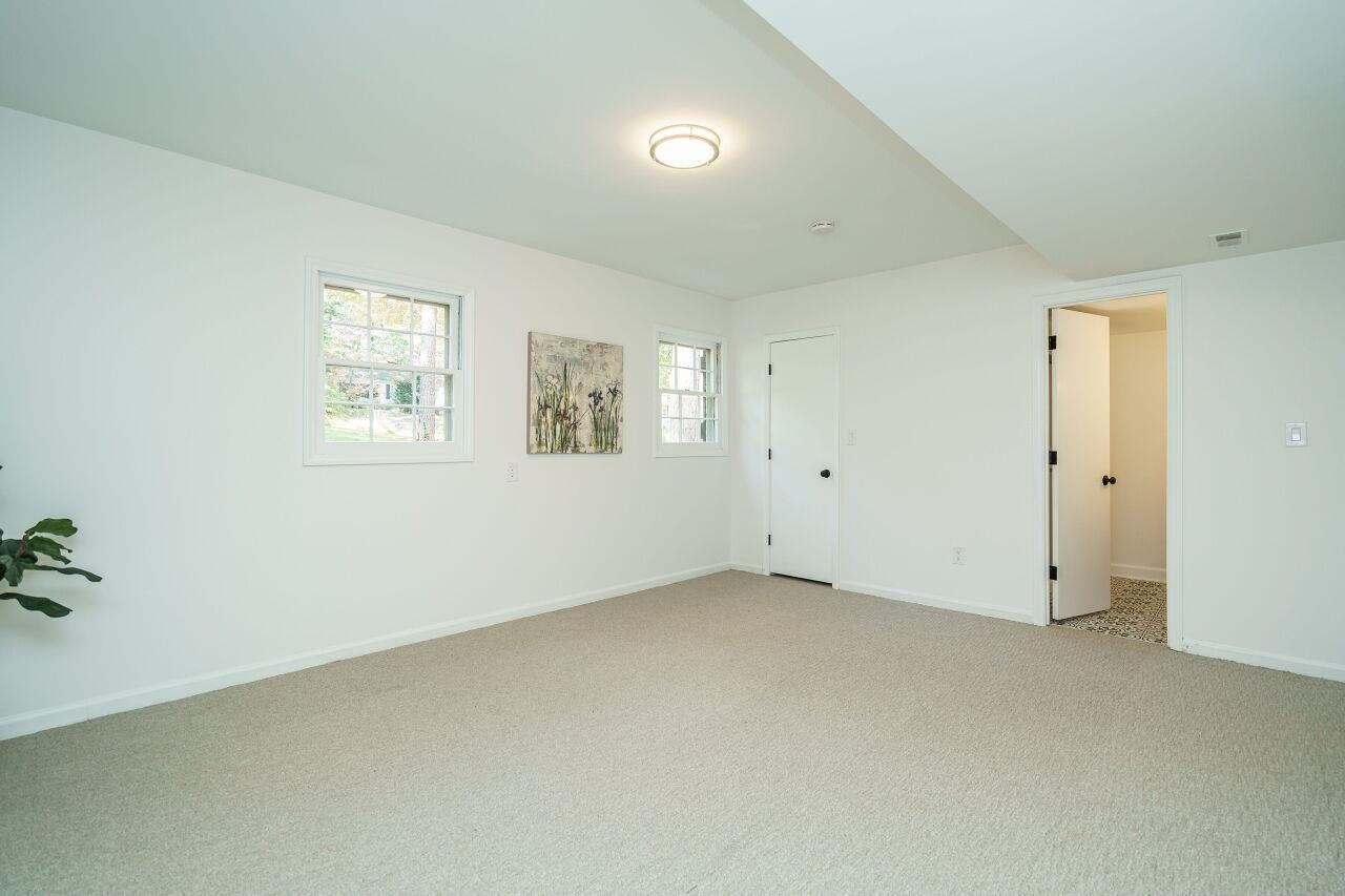 1436 Princess Anne Road Raleigh, NC 27607 - Photo 30 of 36 an empty room with windows