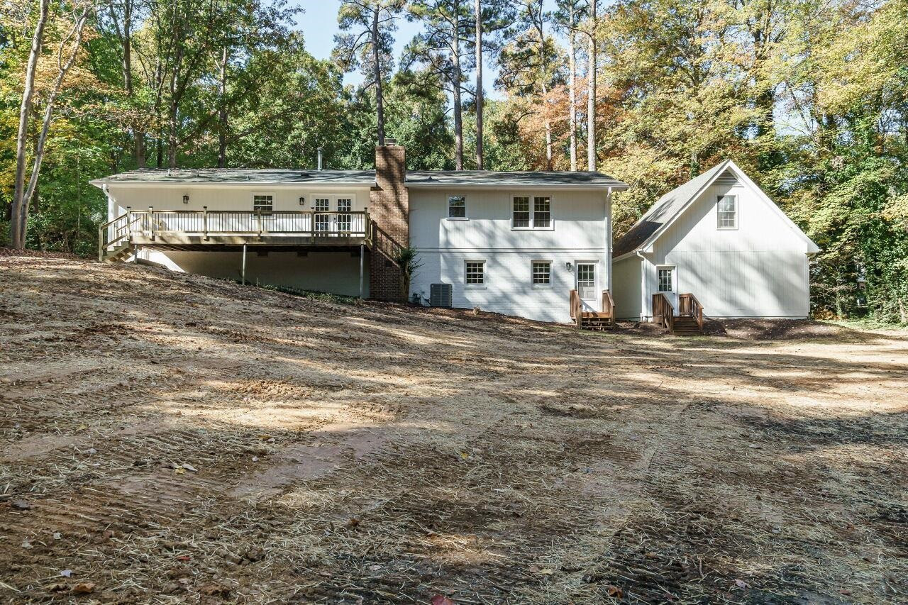 1436 Princess Anne Road Raleigh, NC 27607 - Photo 34 of 36 a view of a house with a back yard
