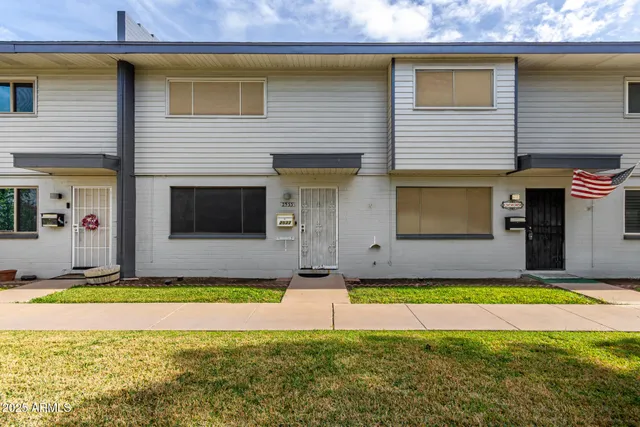 a view of a house with swimming pool