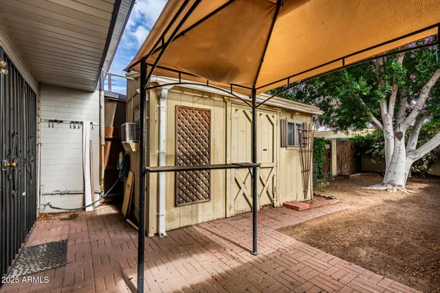 a view of a house with a street