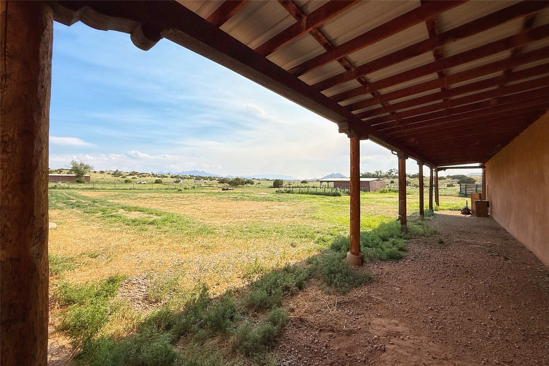 54 Rons Road Santa Fe, NM 87508 - Photo 92 of 99 Portal covers two sides of indoor riding arena