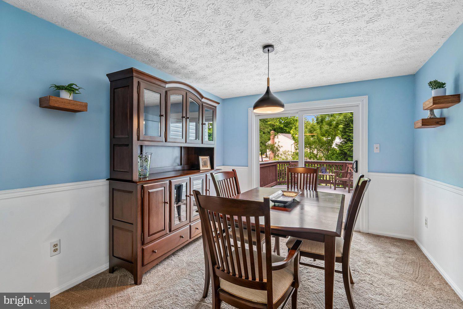 8044 Red Jacket Way Jessup, MD 20794 - Photo 10 of 71 LIGHT-FILLED DINING ROOM W/ CUSTOM SLIDER TO DECK