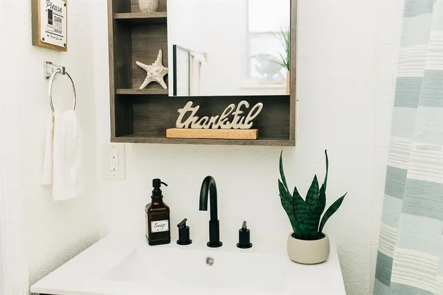 a sign on a wall in front of a building