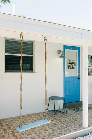 a view of chair and table in kitchen