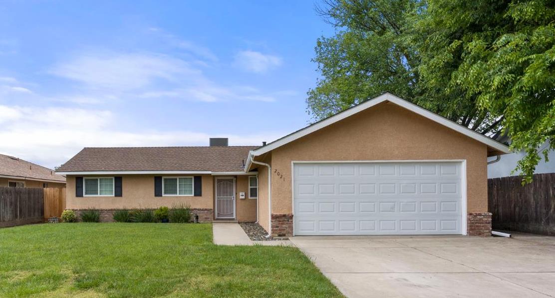 front view of house with a yard