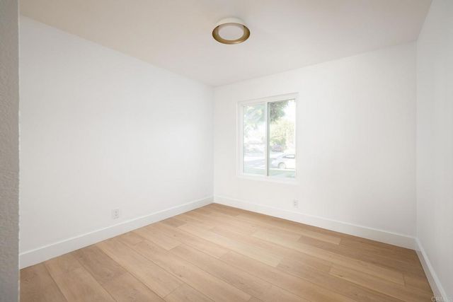 an empty room with a door