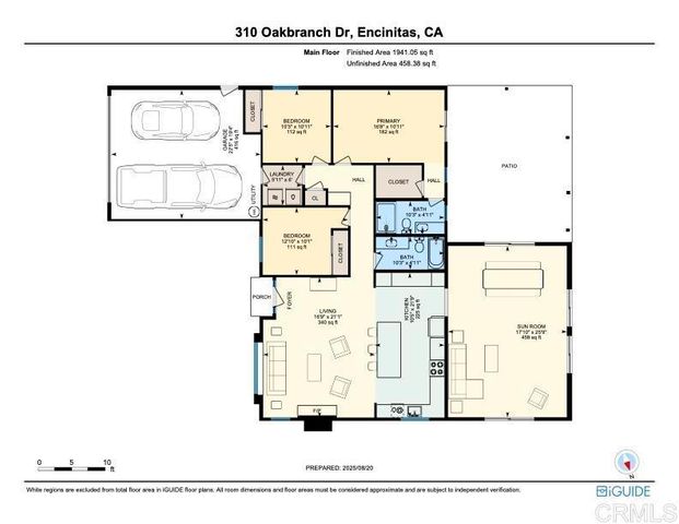 a front view of a house with a yard and plants