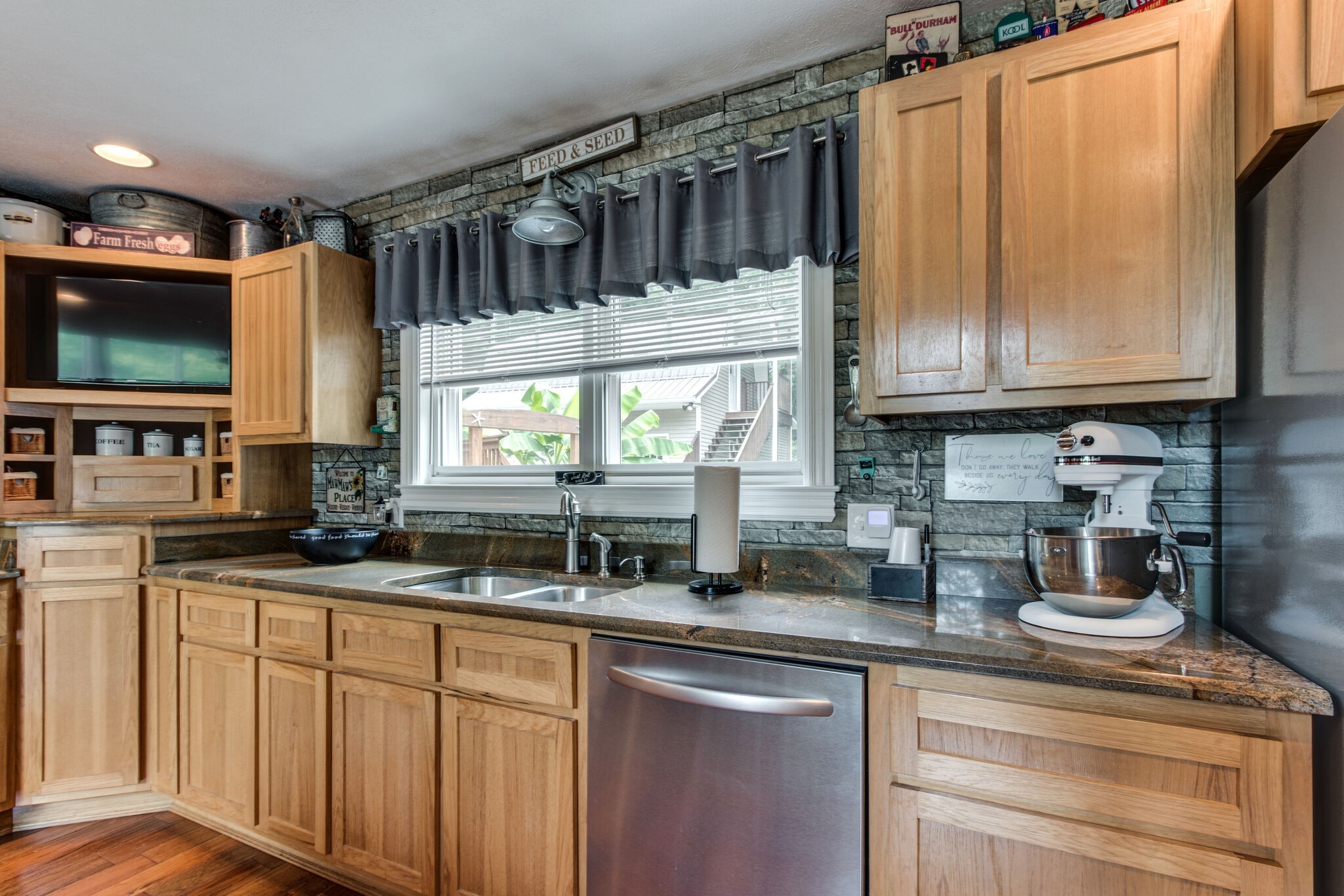 67 Cedar Bend Road Beechgrove, TN 37018 - Photo 13 of 48 a kitchen with stainless steel appliances granite countertop a sink a stove and cabinets