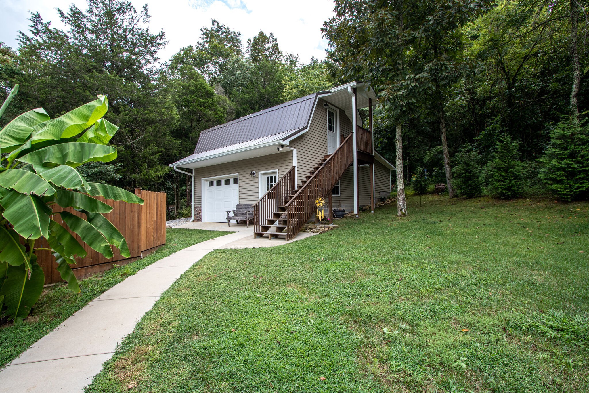 67 Cedar Bend Road Beechgrove, TN 37018 - Photo 31 of 48 a view of a house with backyard and porch