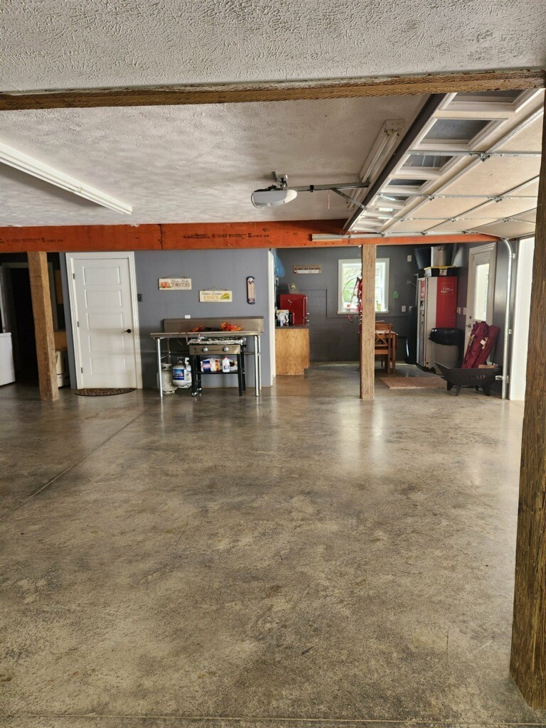 67 Cedar Bend Road Beechgrove, TN 37018 - Photo 36 of 48 a view of a studio with car parked