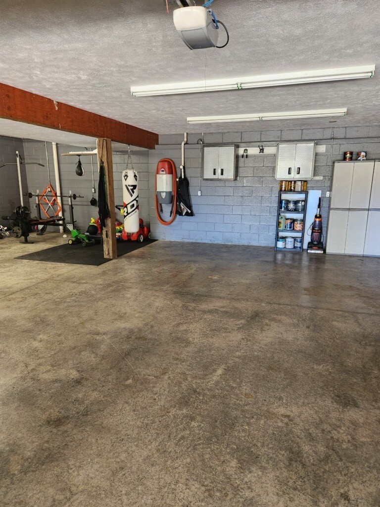 67 Cedar Bend Road Beechgrove, TN 37018 - Photo 37 of 48 a view of a livingroom with furniture and garage