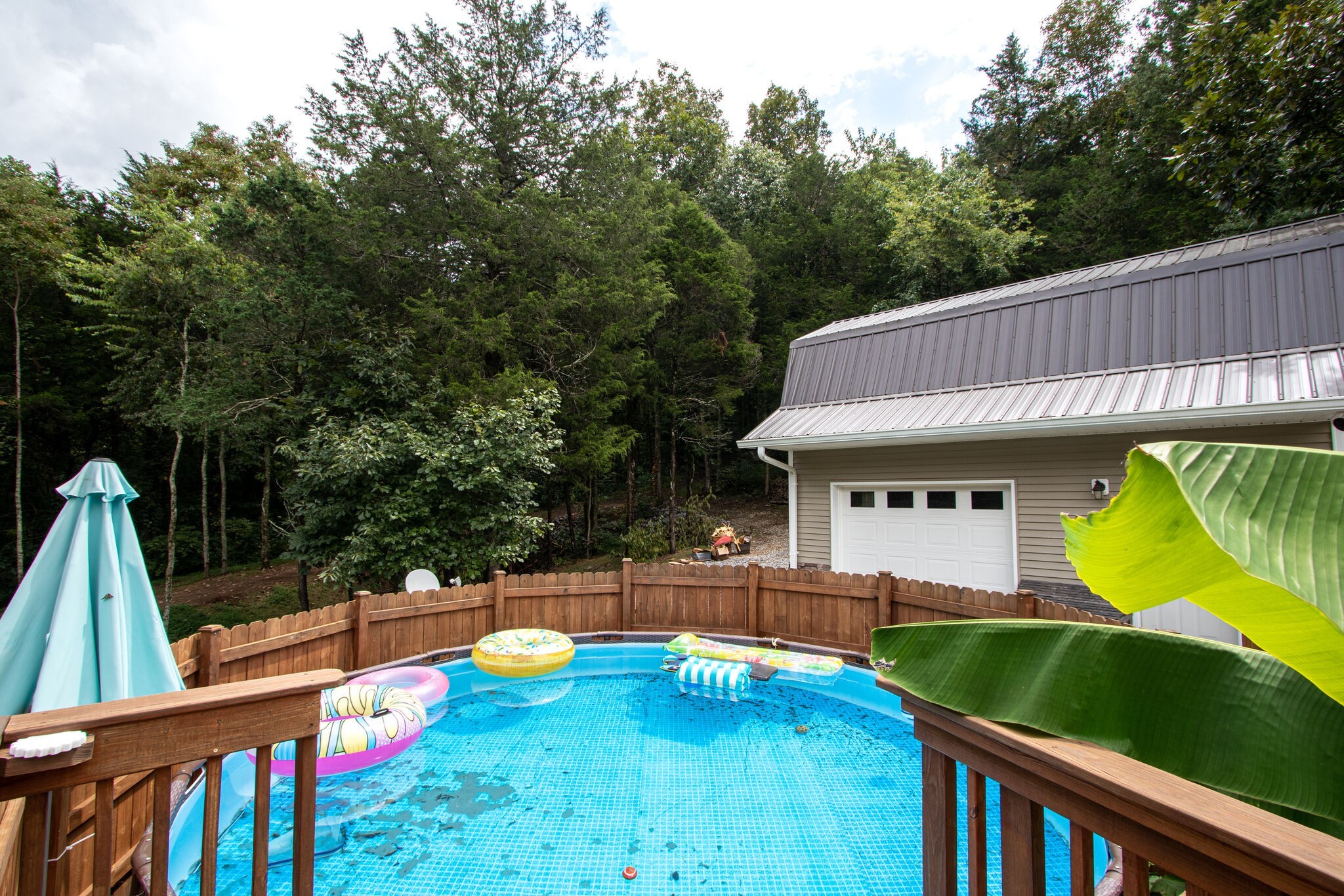 67 Cedar Bend Road Beechgrove, TN 37018 - Photo 42 of 48 a view of a backyard with swimming pool