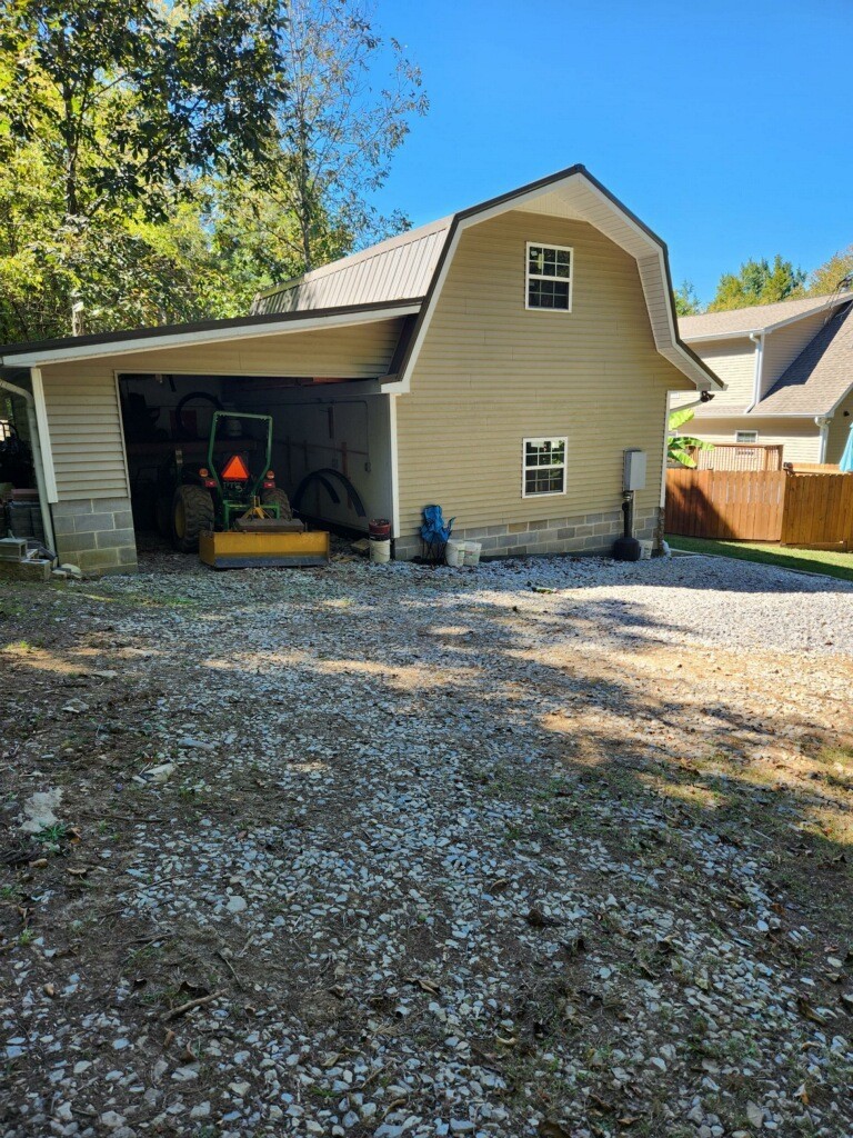 67 Cedar Bend Road Beechgrove, TN 37018 - Photo 43 of 48 a view of two house with a yard