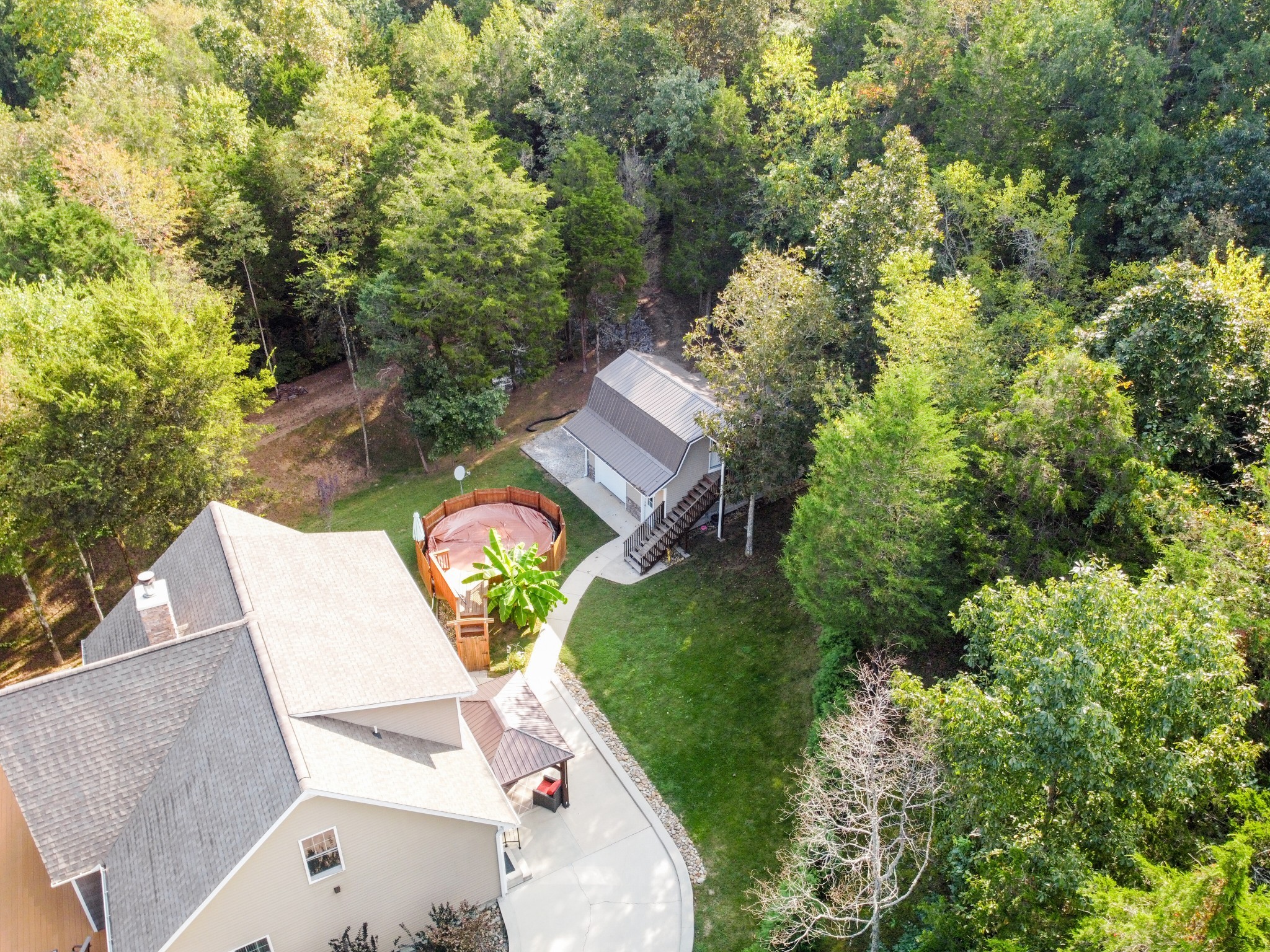 67 Cedar Bend Road Beechgrove, TN 37018 - Photo 45 of 48 an aerial view of a house with swimming pool and garden view