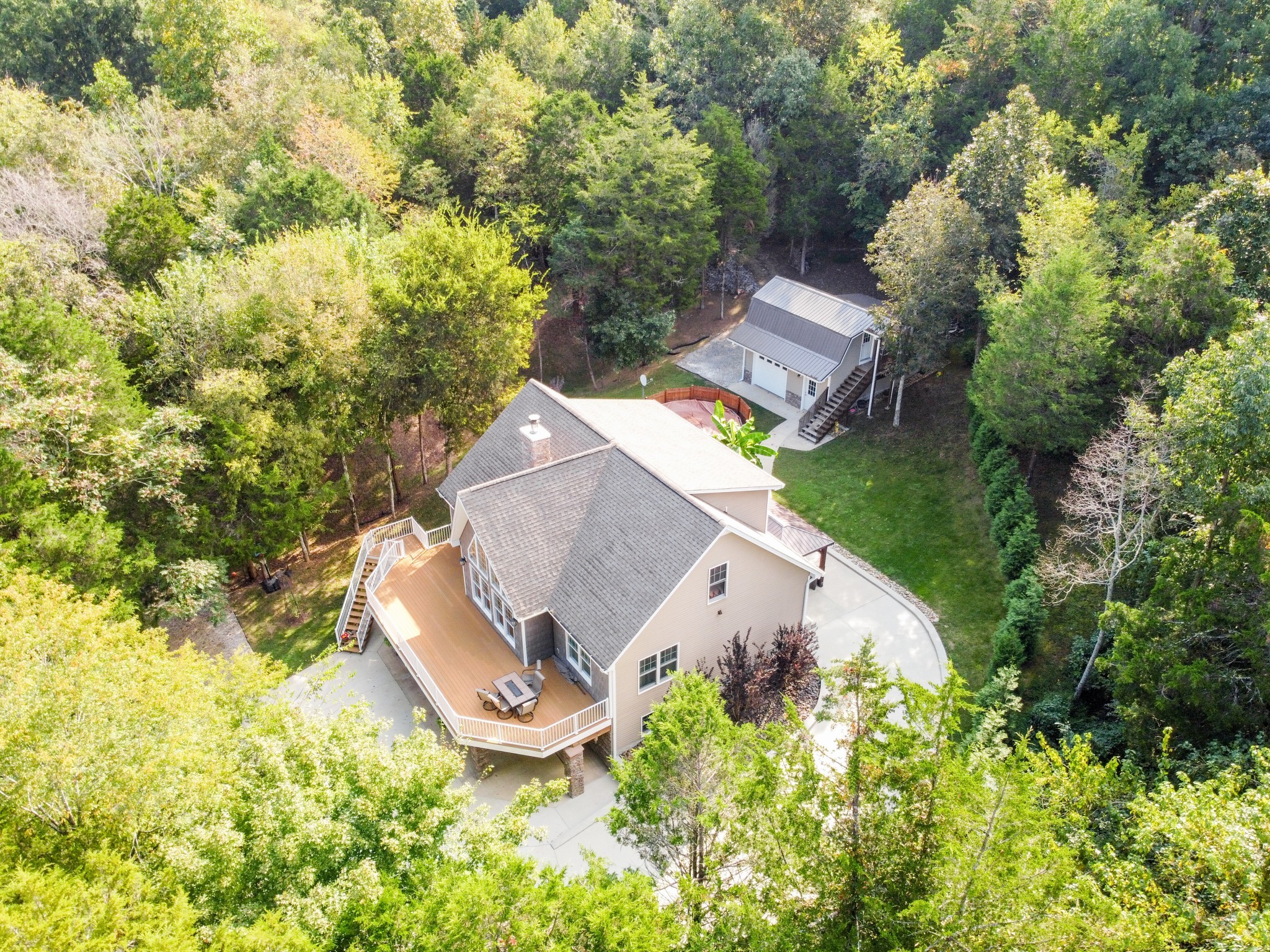 67 Cedar Bend Road Beechgrove, TN 37018 - Photo 46 of 48 an aerial view of a house with a yard and garden