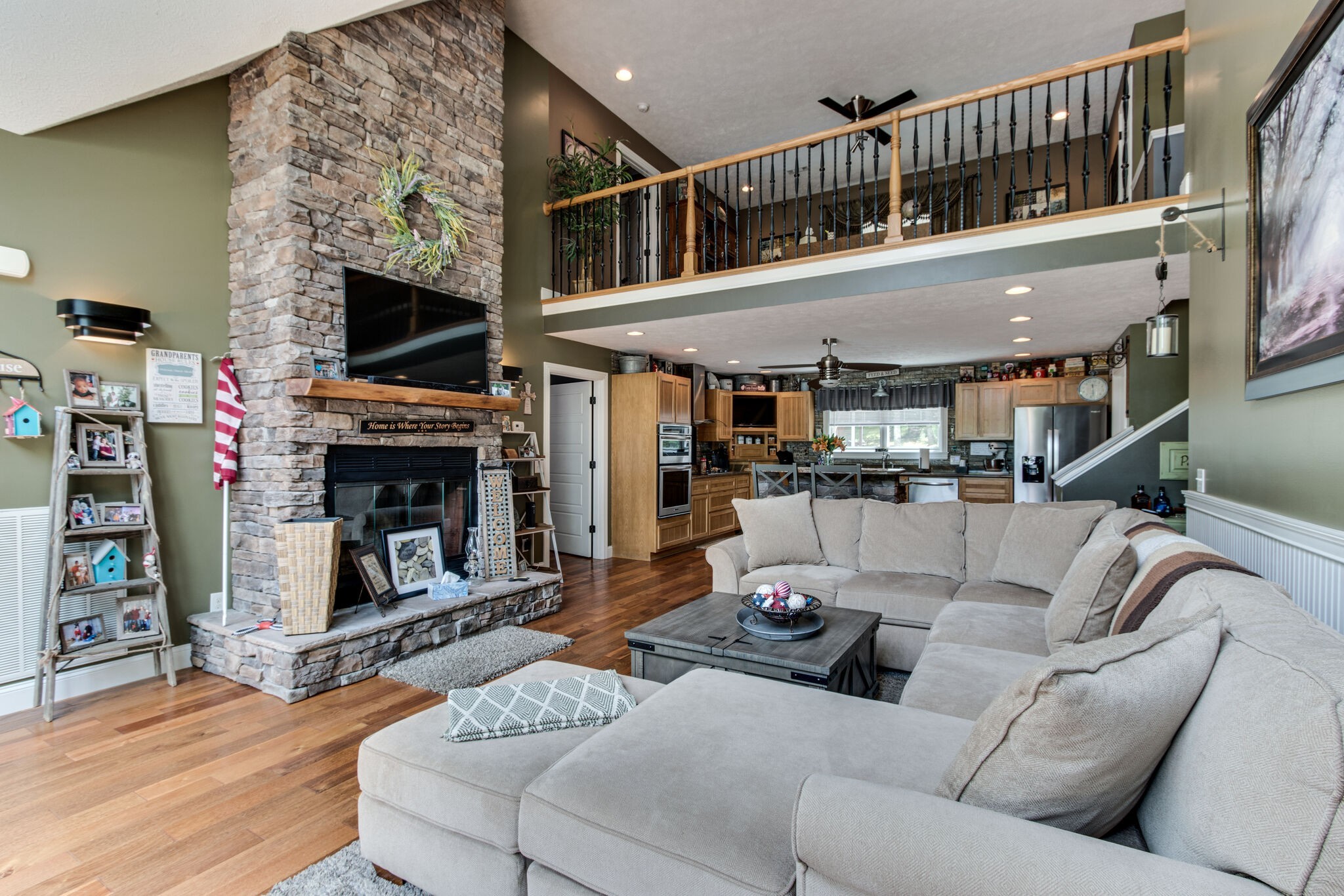 67 Cedar Bend Road Beechgrove, TN 37018 - Photo 7 of 48 a living room with furniture a fireplace and a flat screen tv